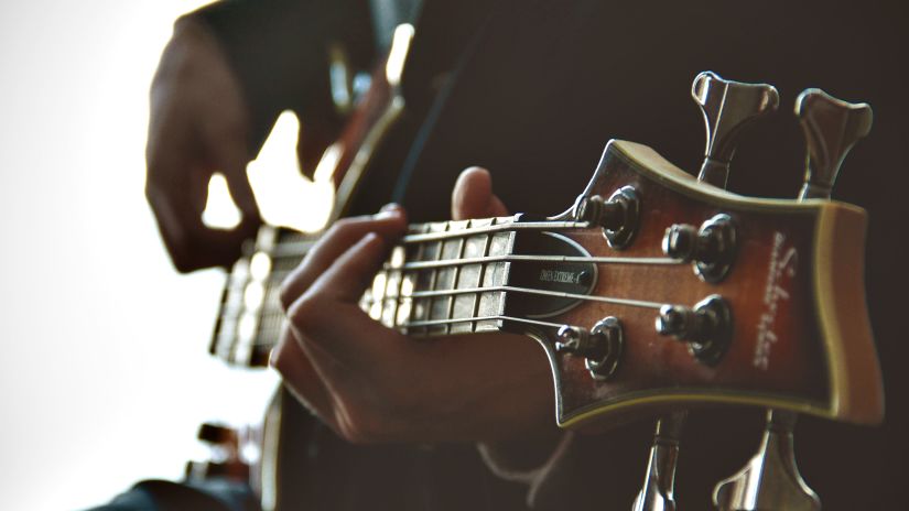 a closeup shot of a person playing a guitar - Polo Floatel Kolkata
