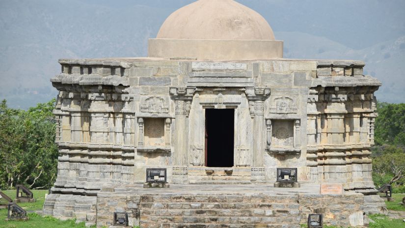 facade image of an Old Temple in Chennai made of stones with blue sky in the background