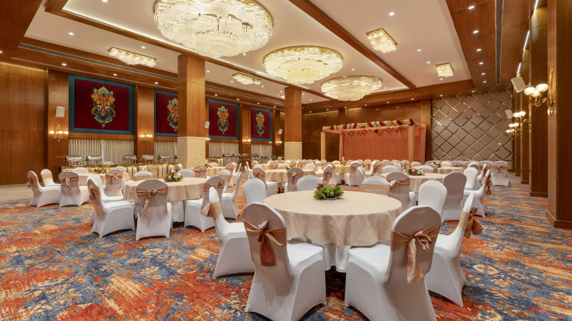 Round seating arrangements at Hybiscuss hall - Shyama Sarovar Portico Orai