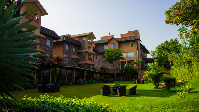 Hotel facade with clean trimmed lawns