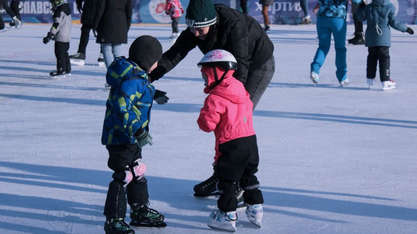 Children ice-skating at a carnival