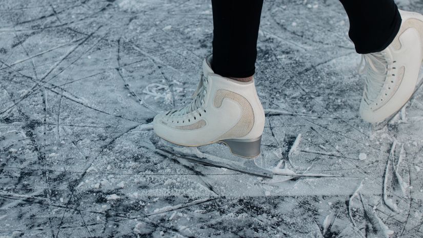 An image of someone's feet ice-skating 