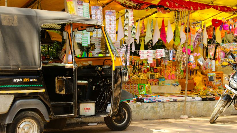 Auto standing in front of shop 