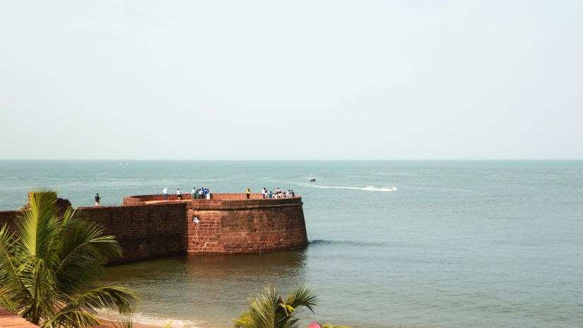 Tourists enjoying the view from the ramparts of a Fort.