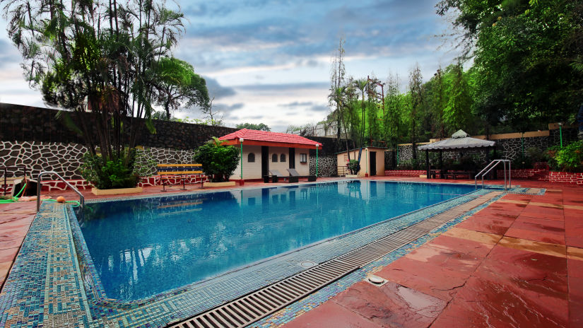 the swimming pool area - Zara's Resort 3