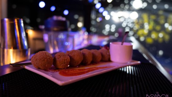 Round red crumb starter dish in The Bourbon Club N Lounge at The Tattva Boutique Resort, Joshimath