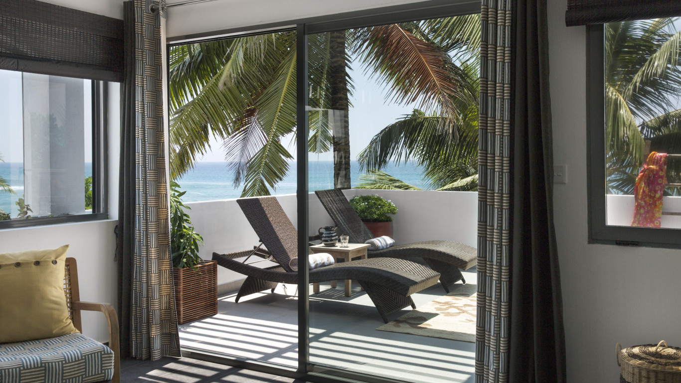 lounge chairs in a balcony