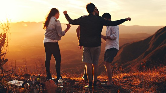 a family on a picnic on a hill