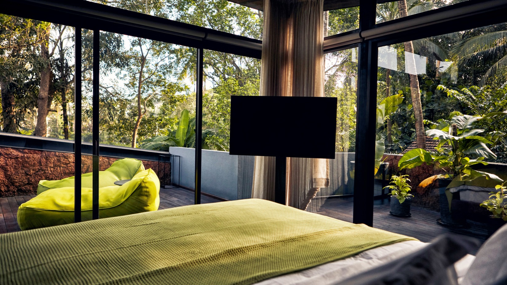 Bedroom with glass windows at one of the best villas in North Goa - Villa in Palms by V Escapes