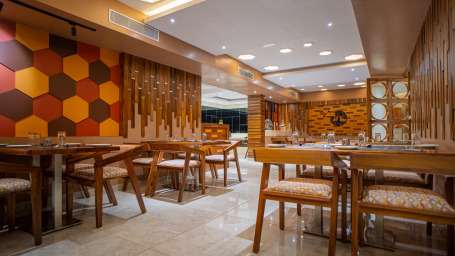 Brown desks and chairs in Honeycomb Restaurant