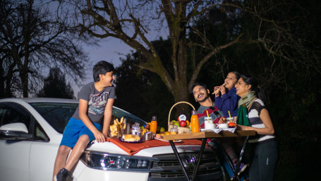 a family having a picnic in Kodaikanal