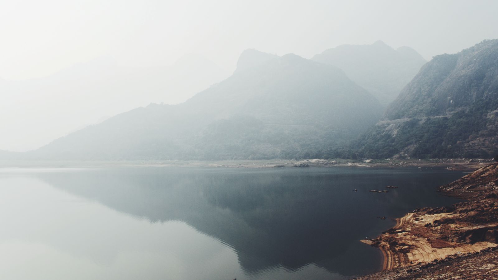 a lake amidst hills 