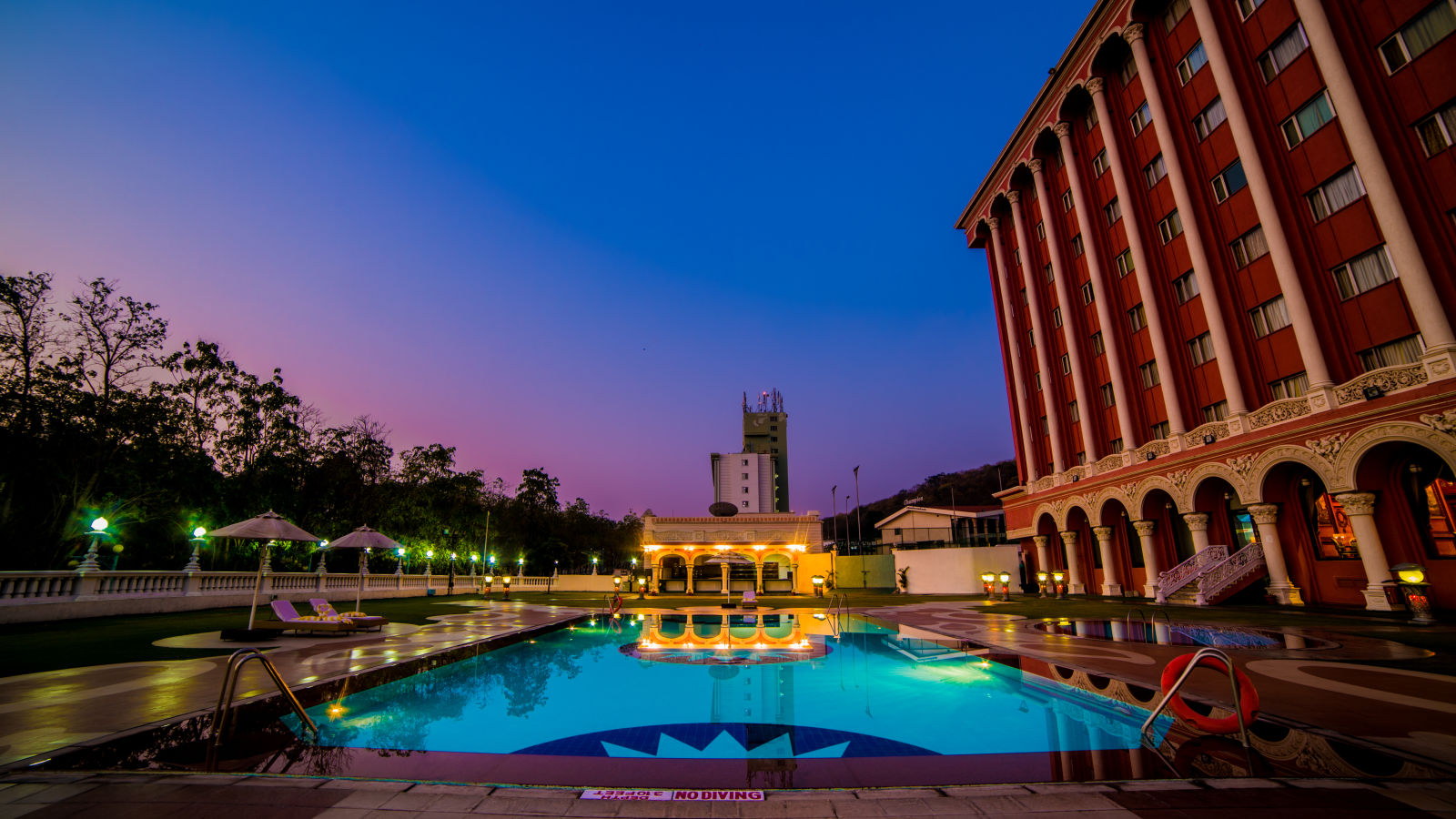 Swimming pool at Sitara Luxury Hotel during blue hour