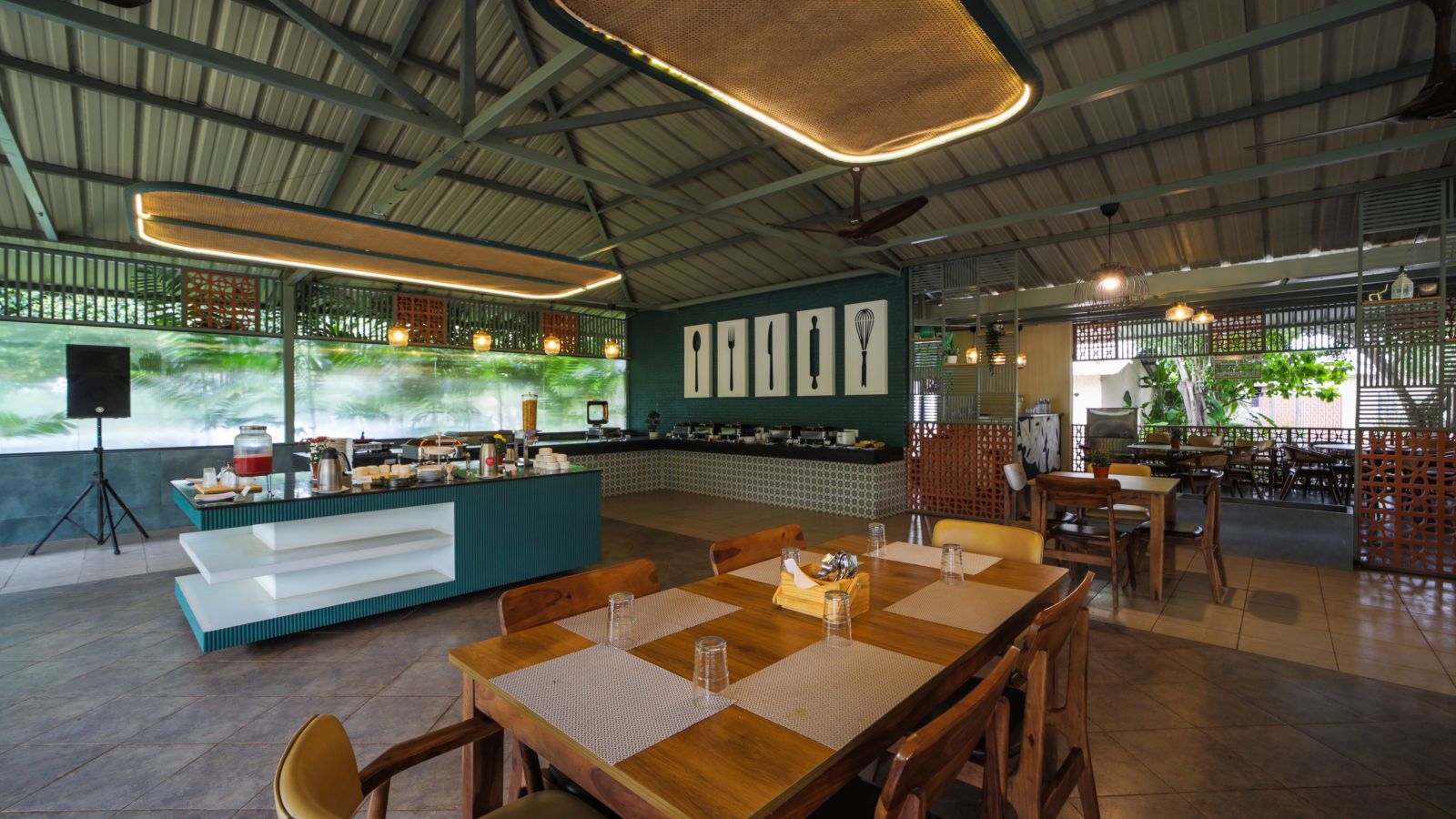 An image of the dining area with open wall arrangement - Trance Veechika Resort, Vikarabad