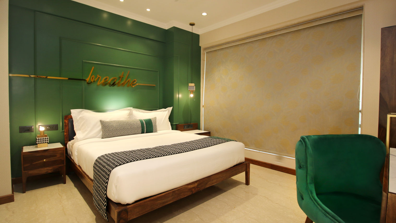 rooms with a king bed and modern interiors at theory9 bandra