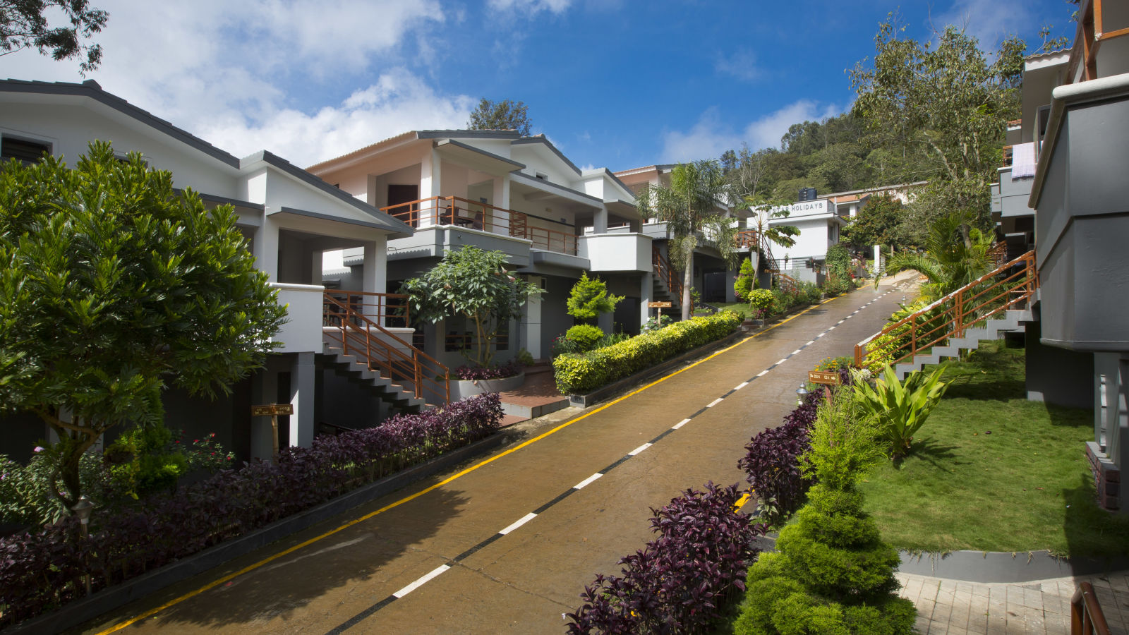 Exterior of TGI Star Holiday Resort on a clear blue day