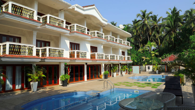 interior view of rooms with swimming pool of White pearl suites by rosetum 