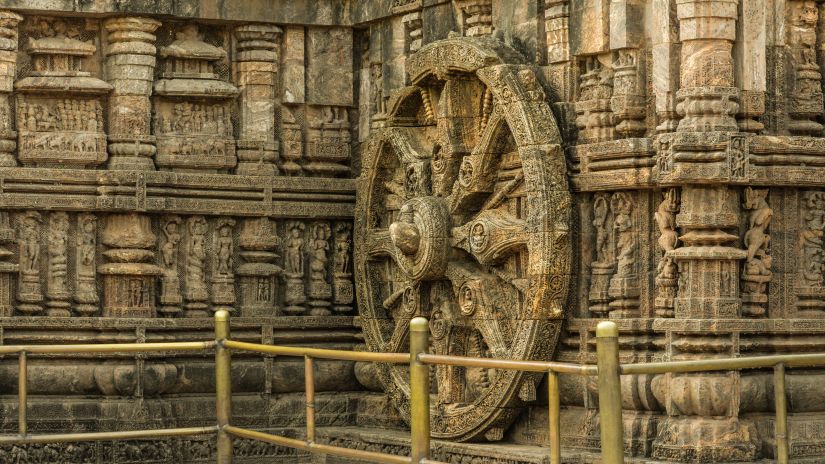 intricately carved stone wheel