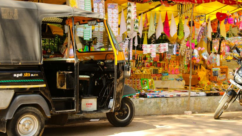 Auto standing in front of shop 