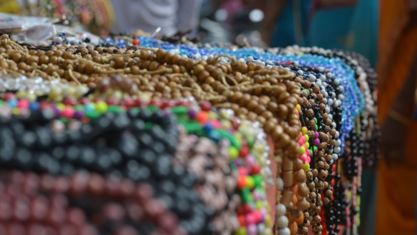 A pile of beads in different colors on a table