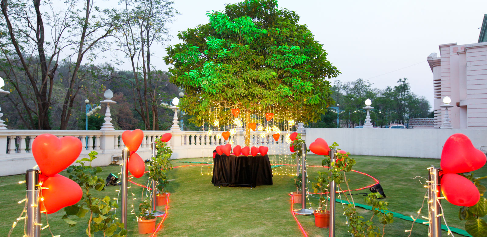 a lawn decorated in a valentine theme during daytime