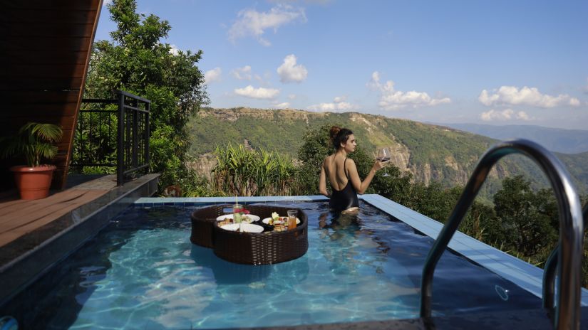 a guest in the pool - Polo Orchid Resort, Cherrapunji