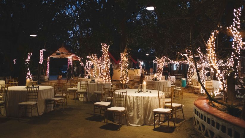 Seating arrangements in an open air setting at The canopy, Capitol Village Resort, Madikeri