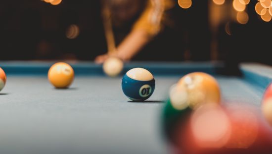 alt-text pool ball placed on a billiard table