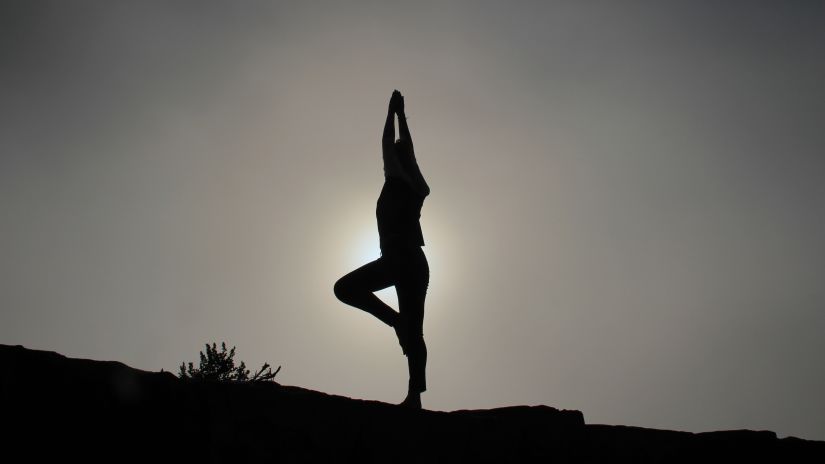 A girl performing asanas 1