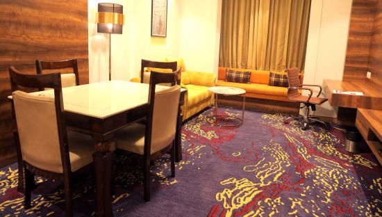 alt-text room with separate living area at best western vrindavan