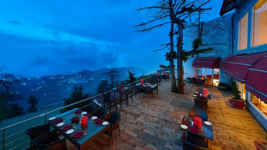 Outdoor dining area featuring  tables and chairs - Renest Dunsvirk Court Mussoorie