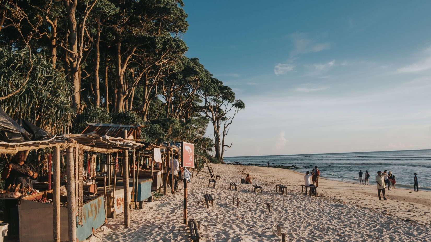 people enjoying on a beach during daytime