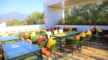 Comfotable chairs at roof top restaurant