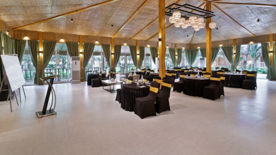 Banquet hall with serene interior decoration at Aralea Beach Resort by Stone Wood, Morjim