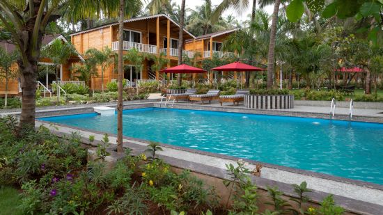 Outdoor swimming pool at Aralea Beach Resort by Stone Wood, Morjim