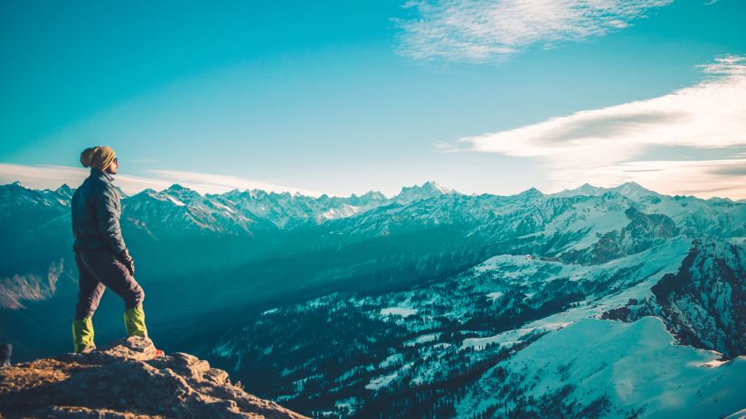 Man on hill top with a view