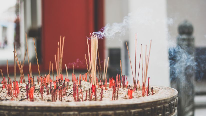 incense lit at a temple