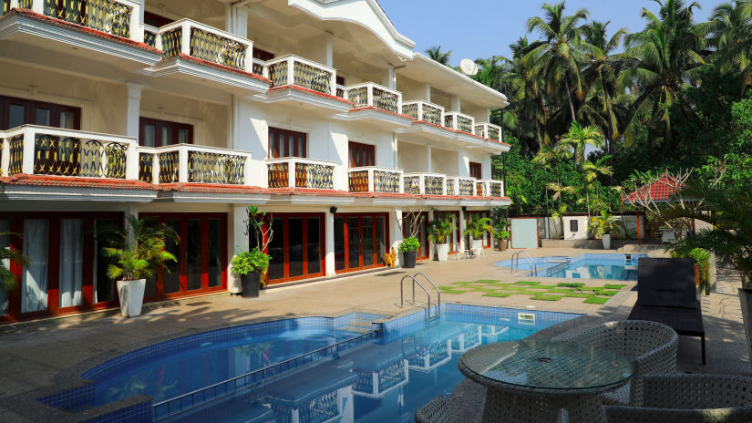 interior view of rooms with swimming pool of White pearl suites by rosetum 