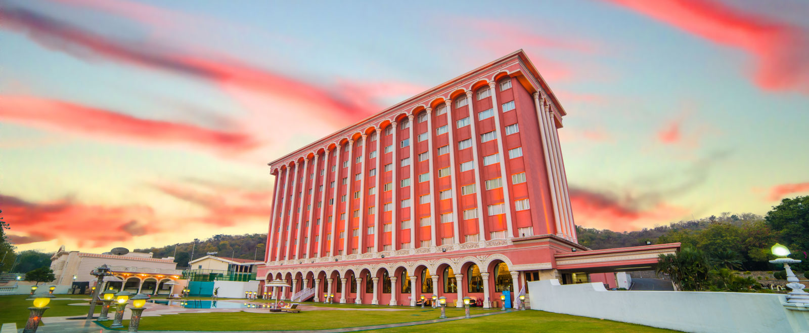 Facade of Sitara Luxury Hotel during the evening