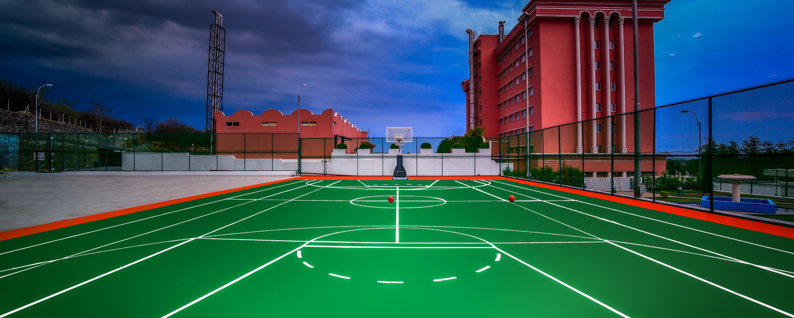 a shot the basketball court during dusk at Hotel Tara, Hyderabad