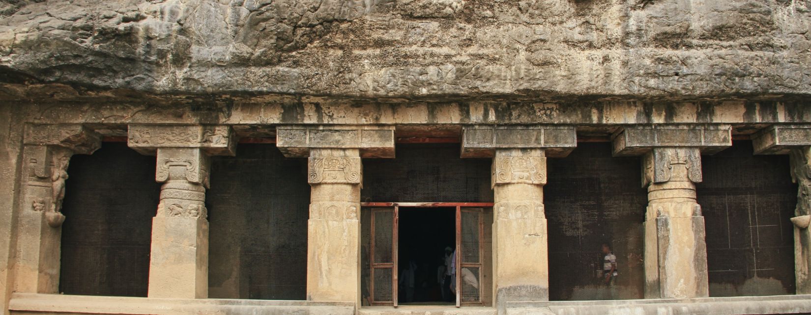 entrance to a building with large pillars