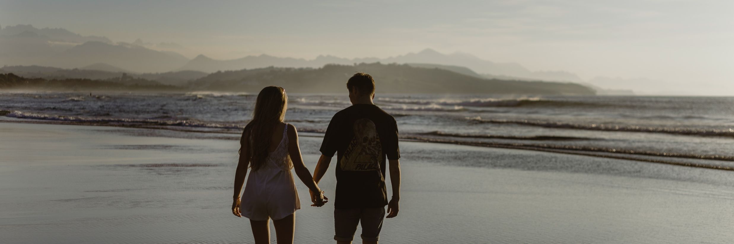 couple Walking on the beach @ Lamrin Ucassaim Hotel, Goa