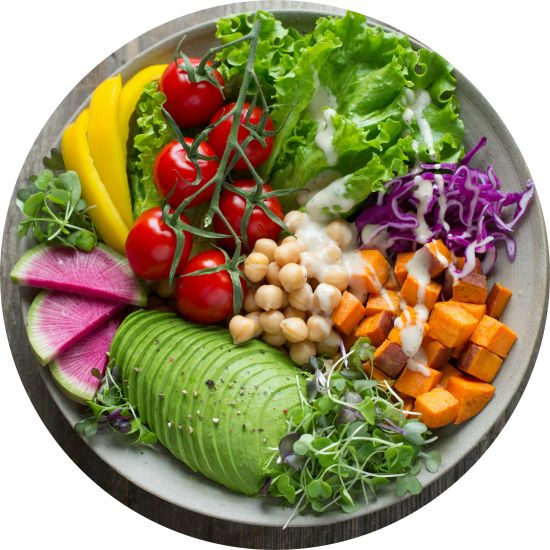 an bowl of assorted vegetables on a table