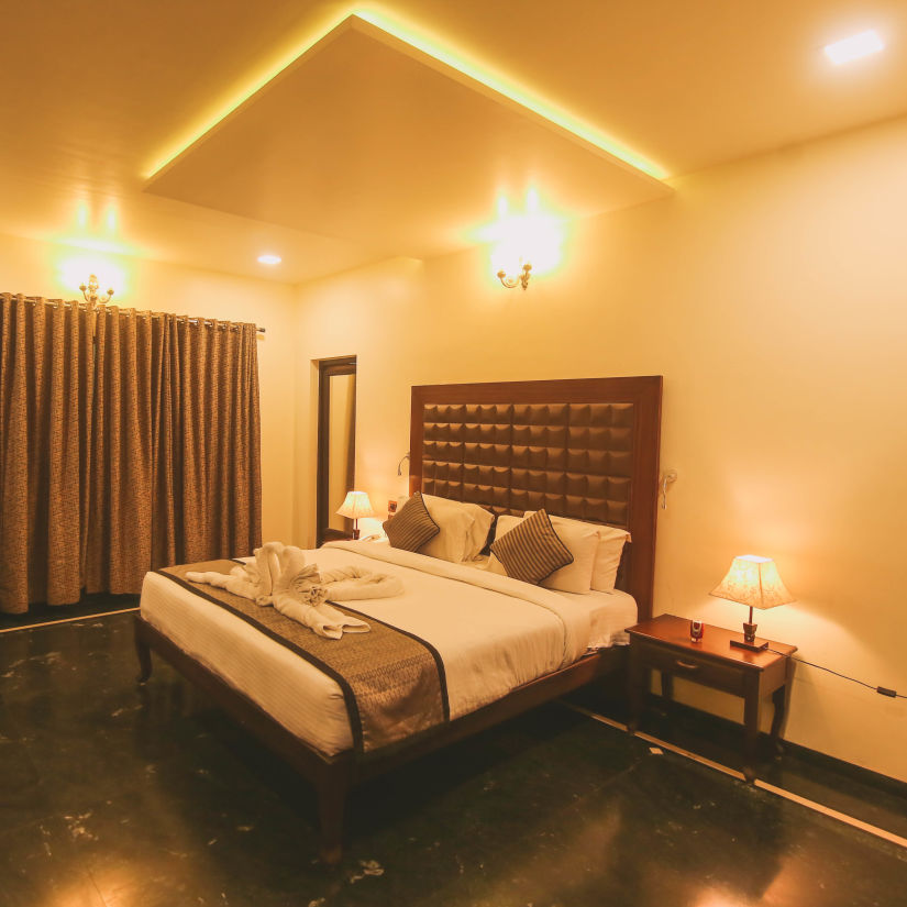 Damanganga Valley Resorts Pvt Ltd - the king size bed offered at the Director's Suite in Daman