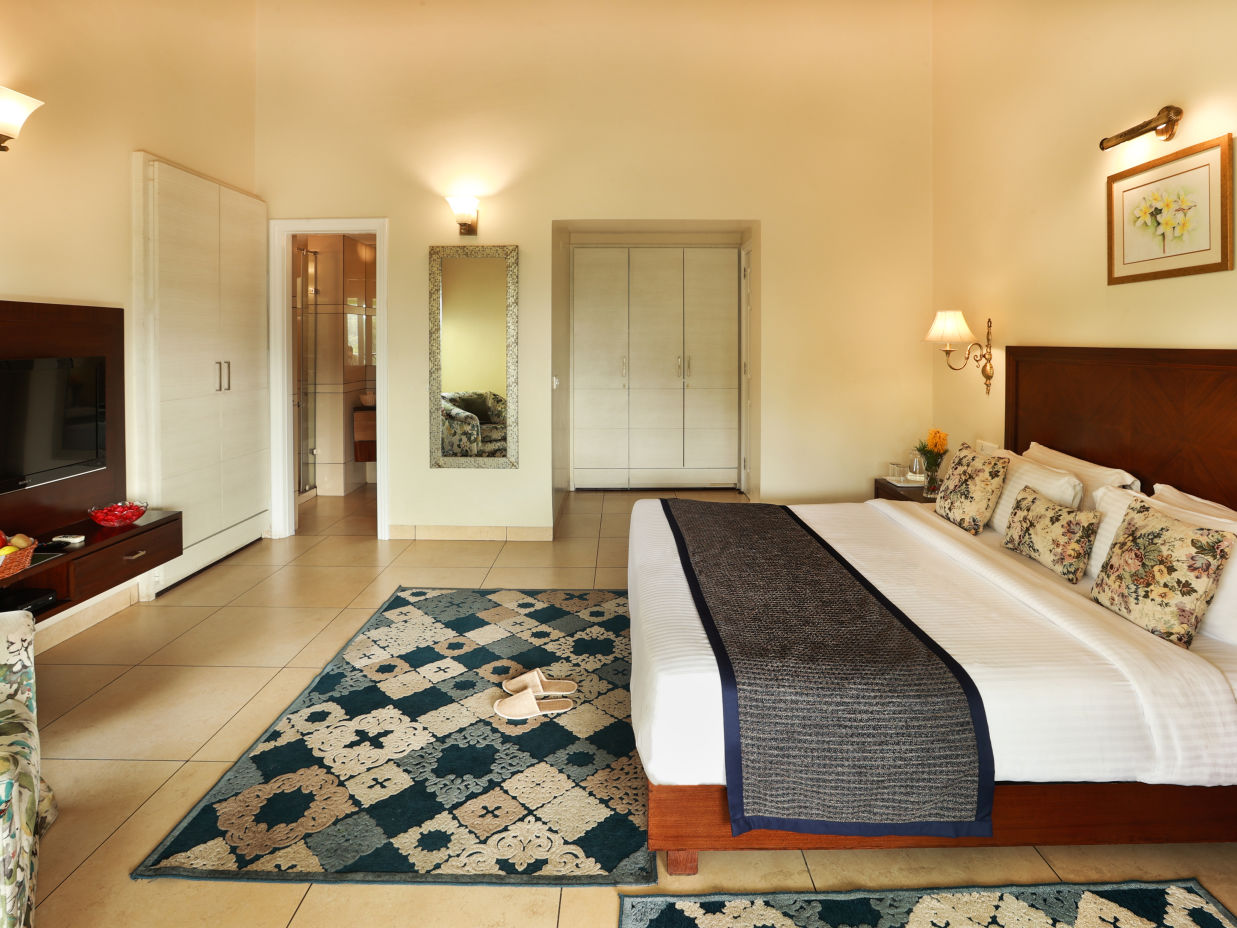 Room with blue carpet @  Lamrin Hotels & Resorts