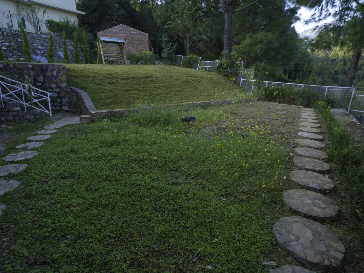 A lawn area of The Nature's Green Resort, Bhimtal