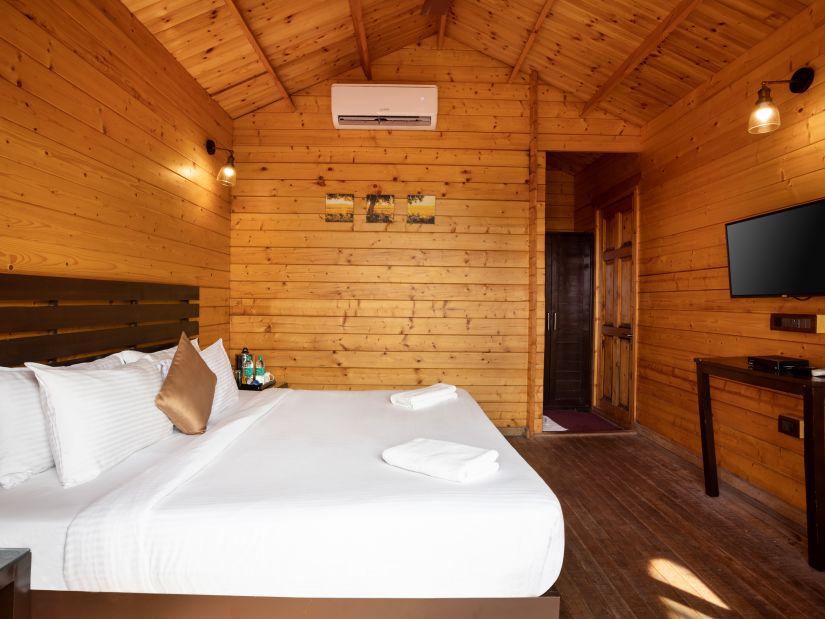 The wooden interior bedrooms at our Wooden Cottages in Mandrem 