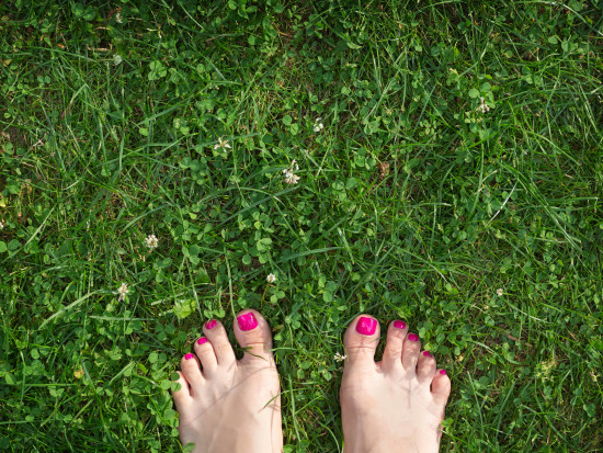 bare-feet-on-the-green-grass-2021-04-05-01-09-40-utc