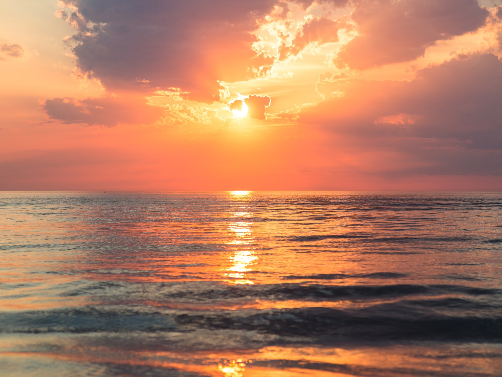 view of a sunset at a beach