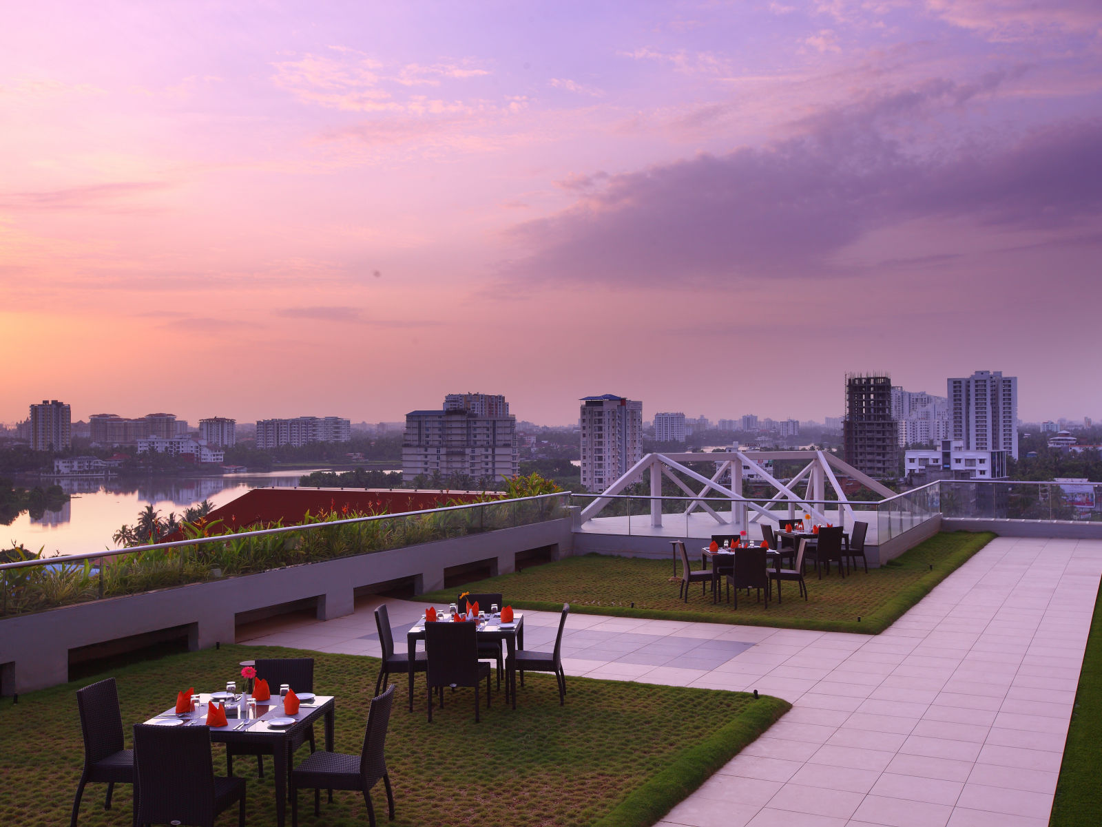 Seating arrangement inside the Terrace Garden in the evening - Starlit Suites, Kochi